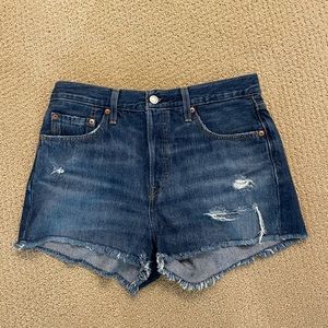 Levi’s 501 dark wash distressed shorts, size 28.